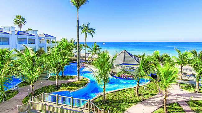 Beautiful view of the infinity pool at azul beach resort negril jamaica