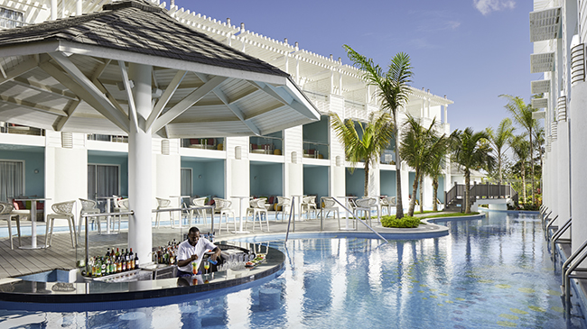 stylish bar located in the pool at the azul beach resort negril jamaica